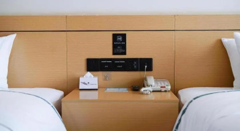 Bed in City Comfort Inn Zhanjiang Xuwen Port Wharf Passenger Station