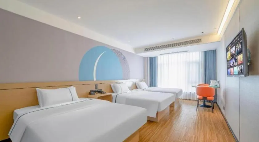 Bed in City Comfort Inn Zhanjiang Xuwen Port Wharf Passenger Station