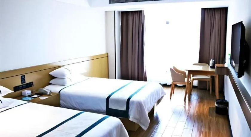Bed in City Comfort Inn Zhanjiang Xuwen Port Wharf Passenger Station