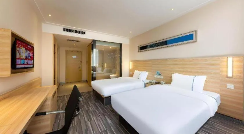 Bed in City Comfort Inn Jingmen Zhongjian Jinxiang Square