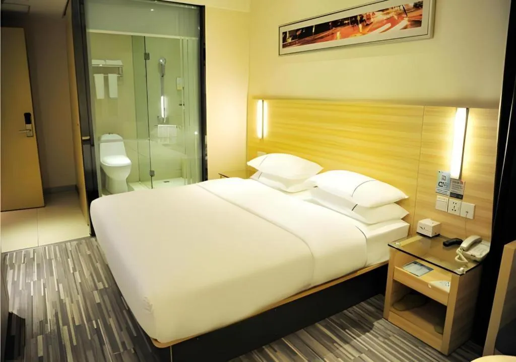 Bed in City Comfort Inn Jingmen Zhongjian Jinxiang Square