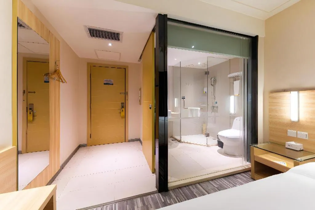 Bed in City Comfort Inn Jingmen Zhongjian Jinxiang Square