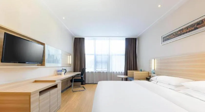 Bed in City Comfort Inn Jingmen Zhongjian Jinxiang Square