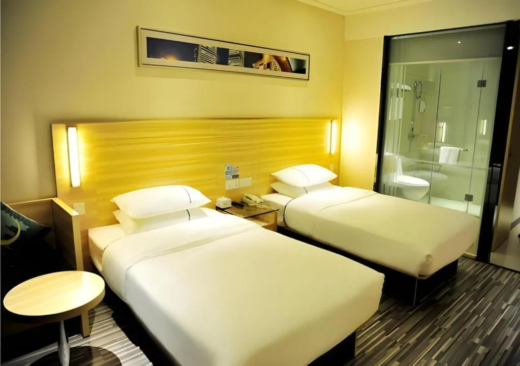 Bed in City Comfort Inn Jingmen Zhongjian Jinxiang Square