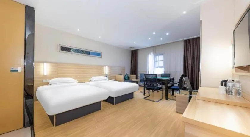 Bed in City Comfort Inn Jingmen Zhongjian Jinxiang Square