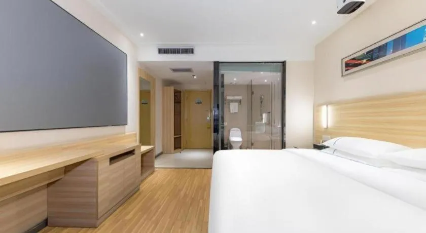 Bed in City Comfort Inn Jingmen Zhongjian Jinxiang Square