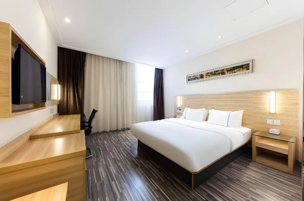 Bed in City Comfort Inn Jingmen Zhongjian Jinxiang Square