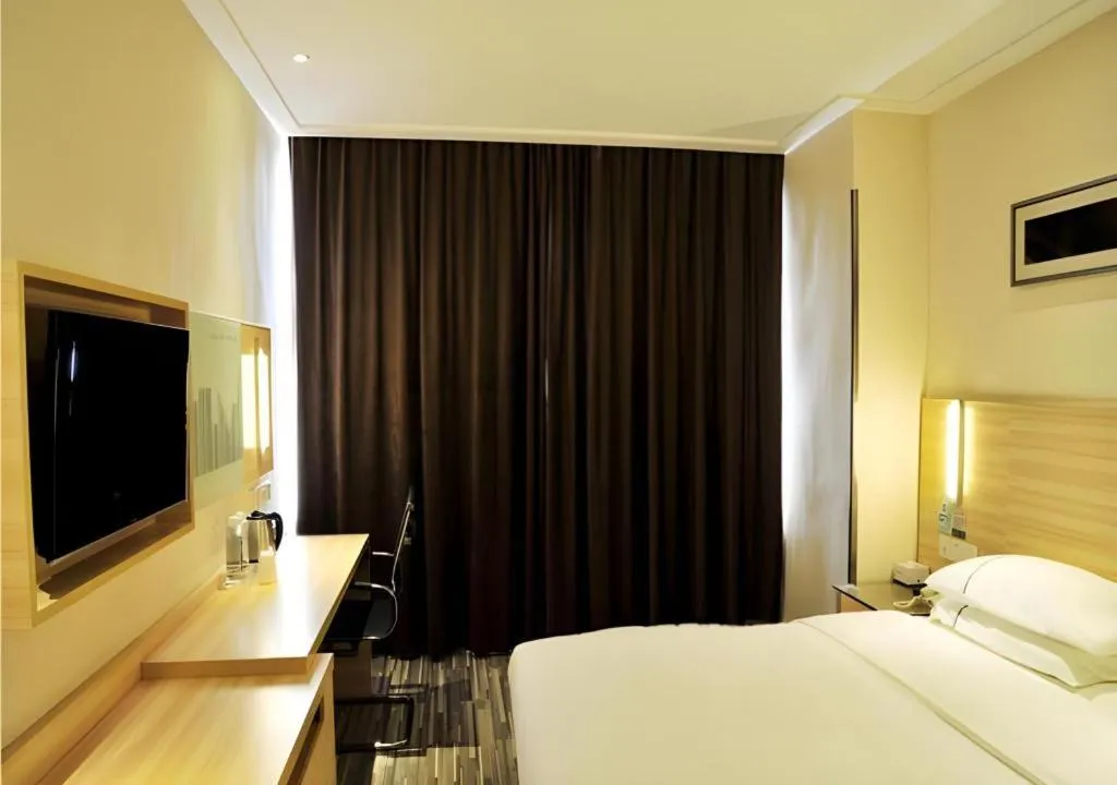 Bed in City Comfort Inn Jingmen Zhongjian Jinxiang Square