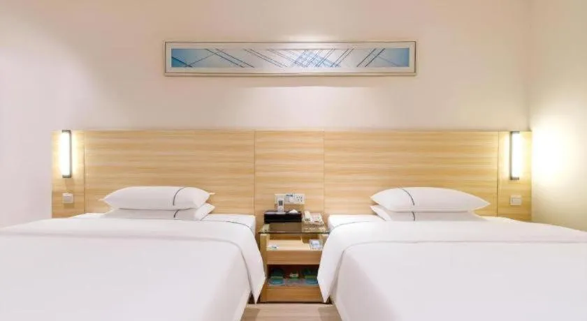Bed in City Comfort Inn Maoming Xinyi Yudu Park