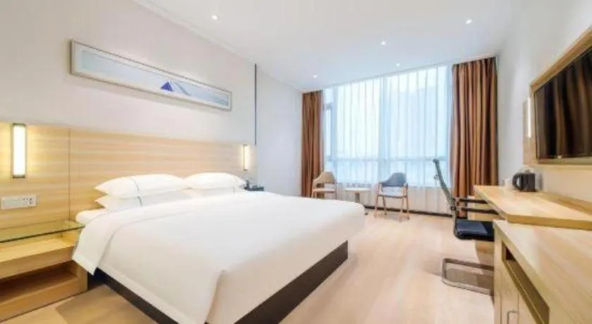 Bed in City Comfort Inn Maoming Xinyi Yudu Park
