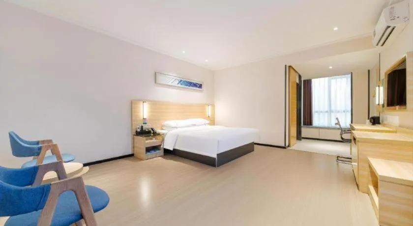 Bed in City Comfort Inn Maoming Xinyi Yudu Park