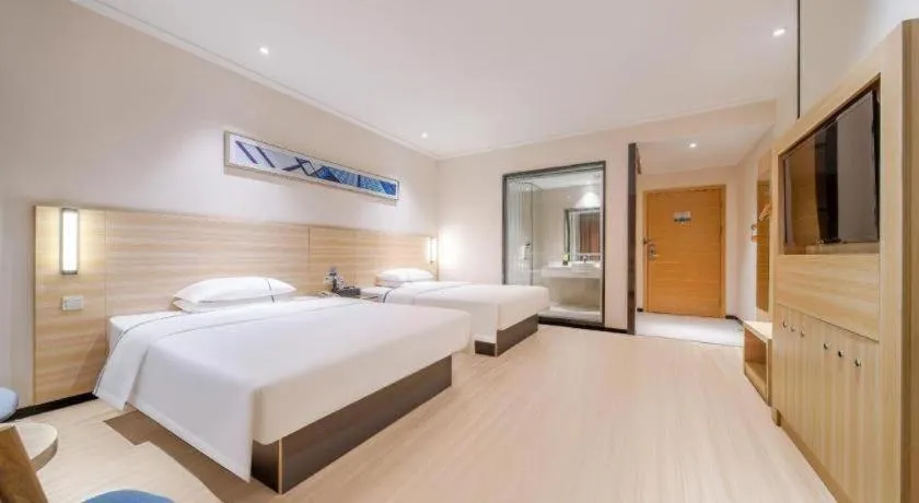 Bed in City Comfort Inn Maoming Xinyi Yudu Park