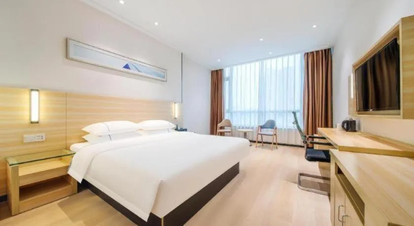 Bed in City Comfort Inn Maoming Xinyi Yudu Park