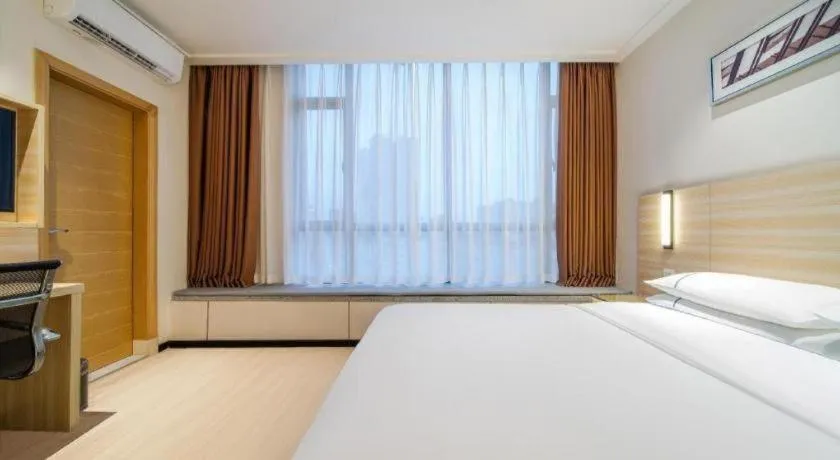 Bed in City Comfort Inn Maoming Xinyi Yudu Park