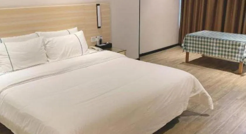 Bed in City Comfort Inn Maoming Xinyi Yudu Park