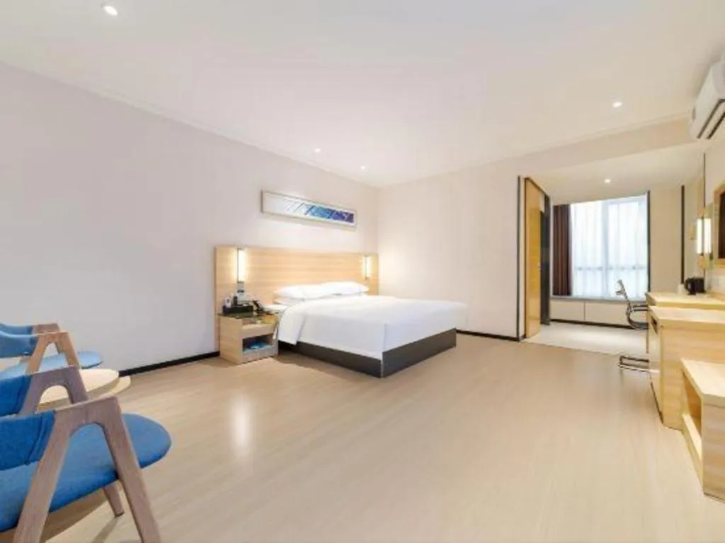 Bed in City Comfort Inn Maoming Xinyi Yudu Park