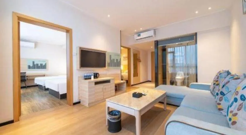 Bed in City Comfort Inn Maoming Xinyi Yudu Park