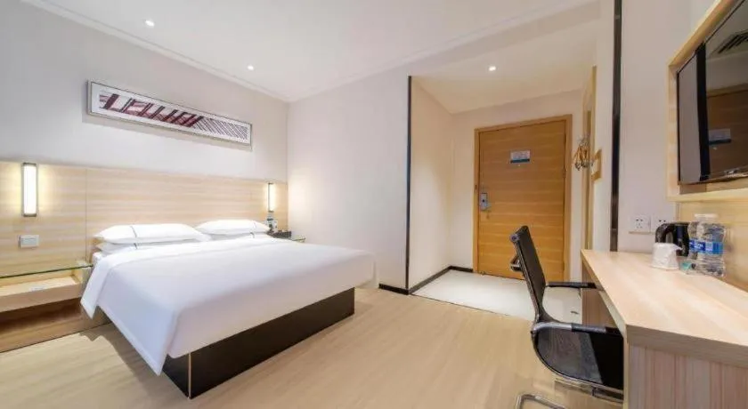 Bed in City Comfort Inn Maoming Xinyi Yudu Park