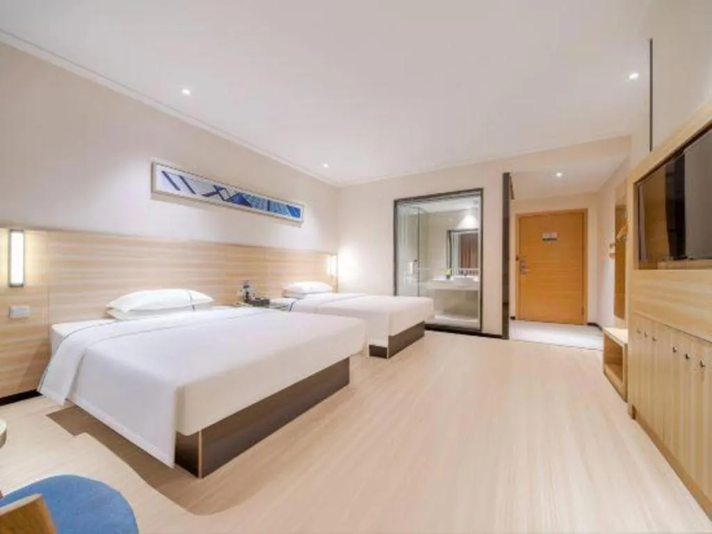 Bed in City Comfort Inn Maoming Xinyi Yudu Park