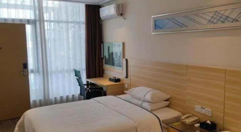 Bed in City Comfort Inn Maoming Xinyi Yudu Park