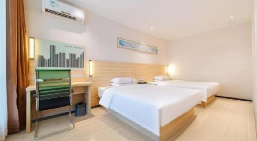 Bed in City Comfort Inn Maoming Xinyi Yudu Park