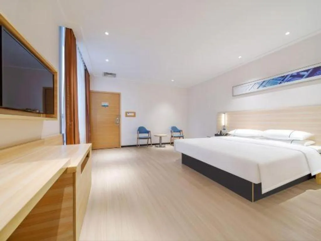 Bed in City Comfort Inn Maoming Xinyi Yudu Park
