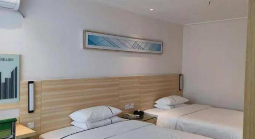 Bed in City Comfort Inn Maoming Xinyi Yudu Park