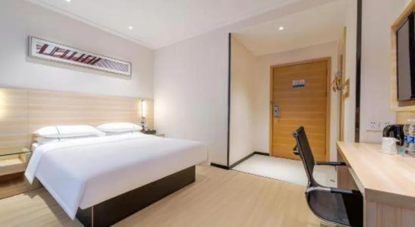 Bed in City Comfort Inn Maoming Xinyi Yudu Park