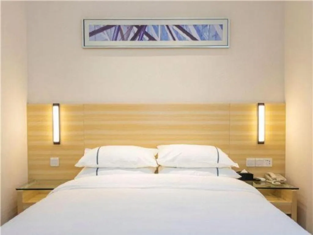 Bed in City Comfort Inn Maoming Xinyi Yudu Park