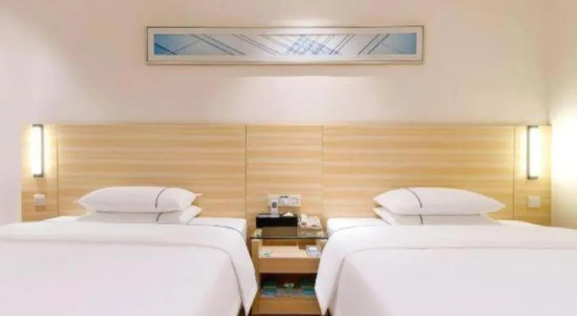 Bed in City Comfort Inn Maoming Xinyi Yudu Park