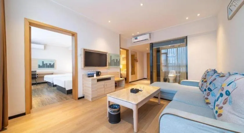 Bed in City Comfort Inn Maoming Xinyi Yudu Park