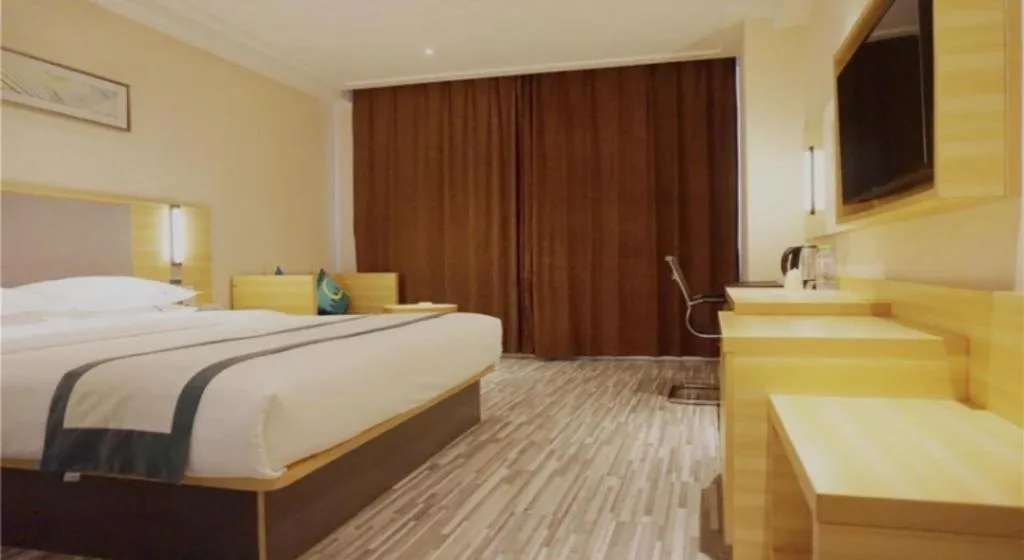 Bed in City Comfort Inn Deyang Shifang Yonghu Park