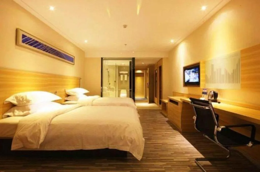 Bed in City Comfort Inn Deyang Shifang Yonghu Park