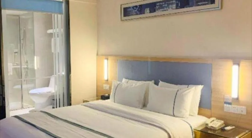 Bed in City Comfort Inn Deyang Shifang Yonghu Park