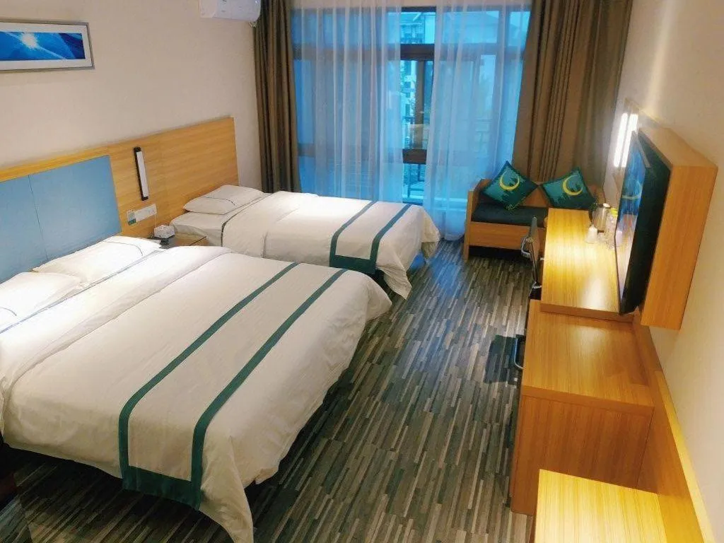 Bed in City Comfort Inn Deyang Shifang Yonghu Park