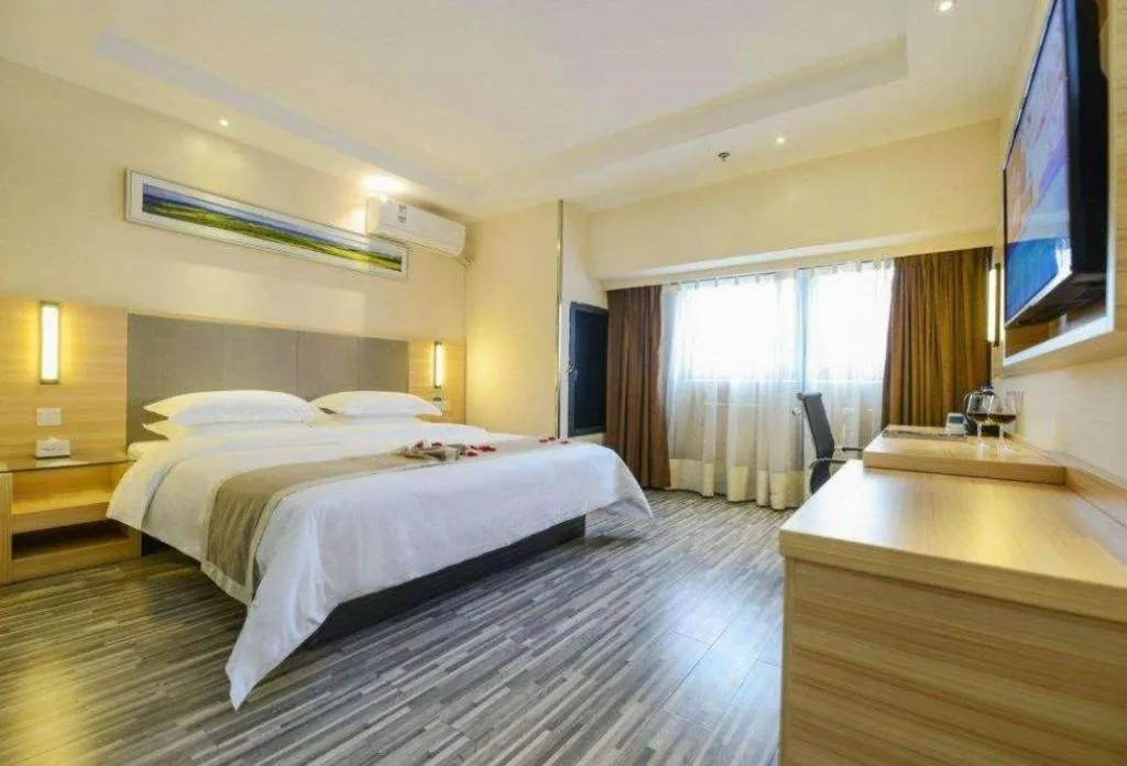 Bed in City Comfort Inn Deyang Shifang Yonghu Park