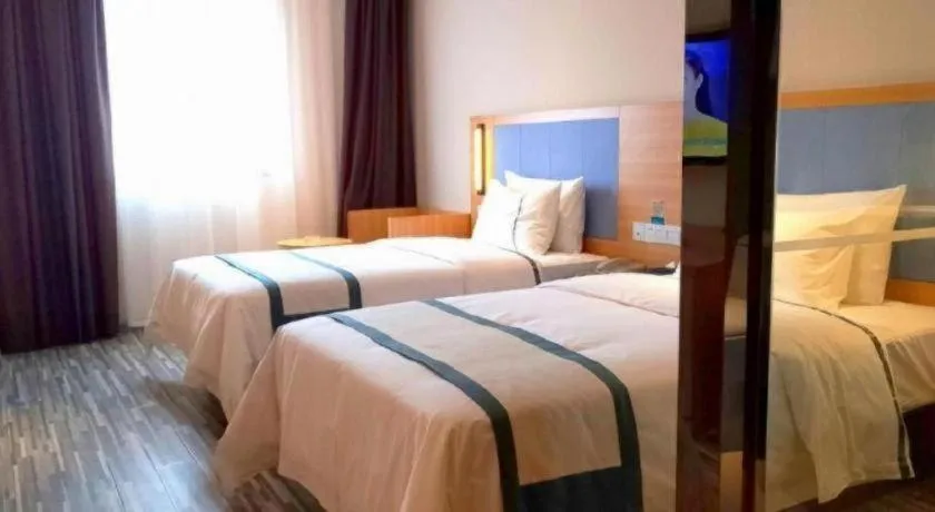 Bed in City Comfort Inn Deyang Shifang Yonghu Park