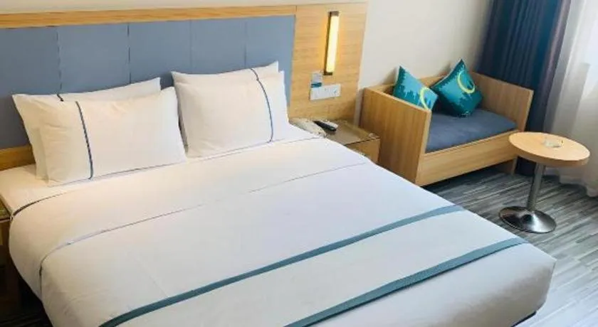 Bed in City Comfort Inn Deyang Shifang Yonghu Park