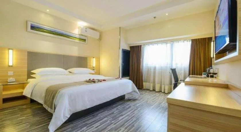 Bed in City Comfort Inn Deyang Shifang Yonghu Park