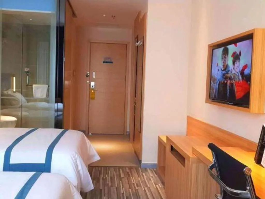 Bed in City Comfort Inn Deyang Shifang Yonghu Park