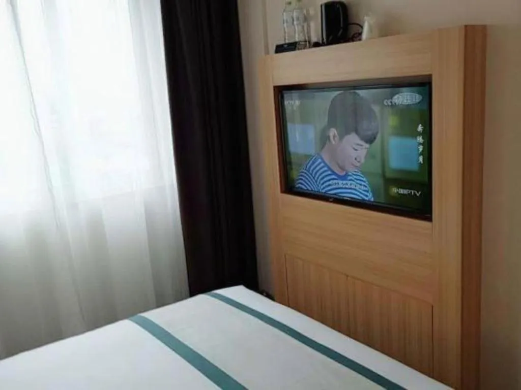 Bed in City Comfort Inn Deyang Shifang Yonghu Park