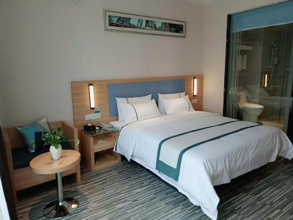 Bed in City Comfort Inn Deyang Shifang Yonghu Park