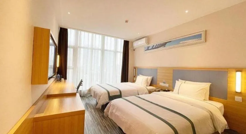 Bed in City Comfort Inn Deyang Shifang Yonghu Park