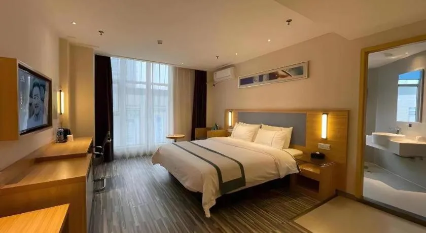 Bed in City Comfort Inn Deyang Shifang Yonghu Park