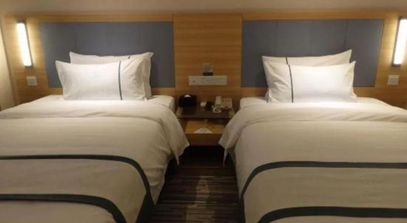 Bed in City Comfort Inn Deyang Shifang Yonghu Park