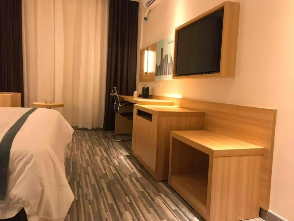 Bed in City Comfort Inn Deyang Shifang Yonghu Park