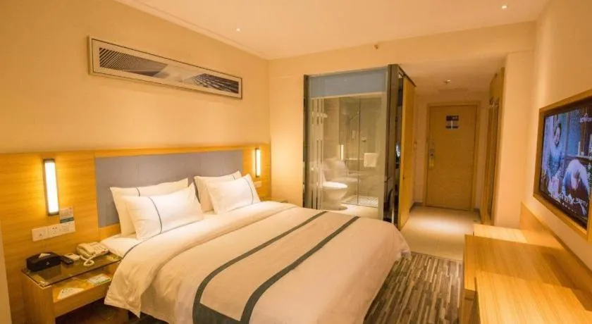 Bed in City Comfort Inn Deyang Shifang Yonghu Park