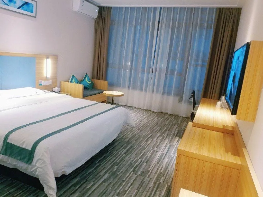 Bed in City Comfort Inn Deyang Shifang Yonghu Park