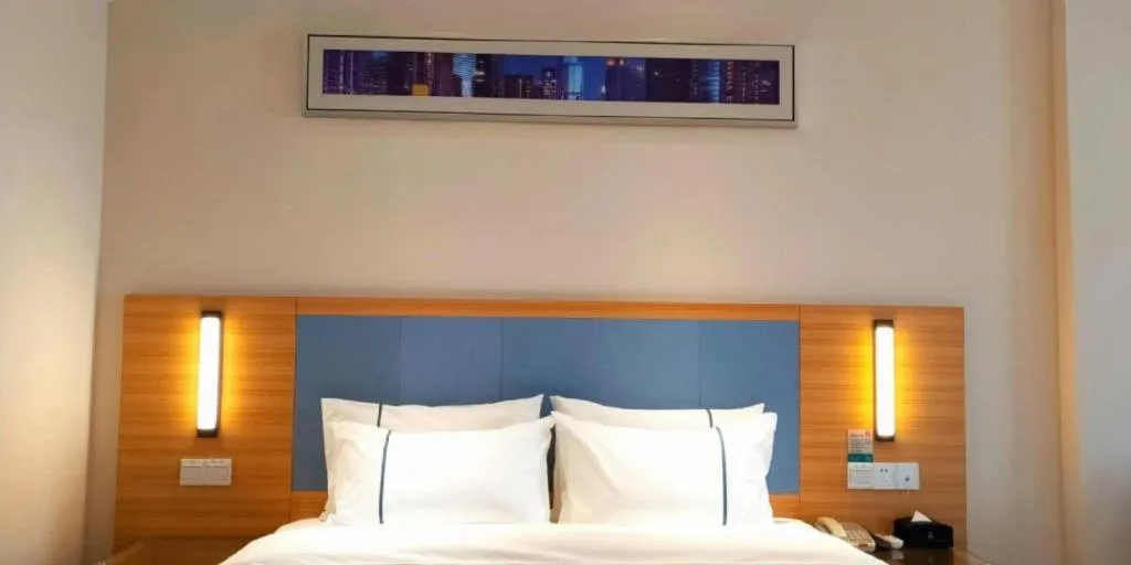 Bed in City Comfort Inn Deyang Shifang Yonghu Park