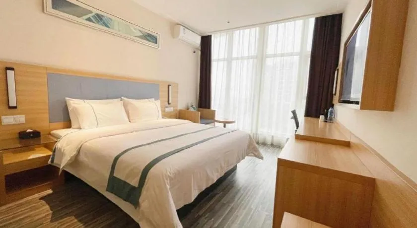 Bed in City Comfort Inn Deyang Shifang Yonghu Park